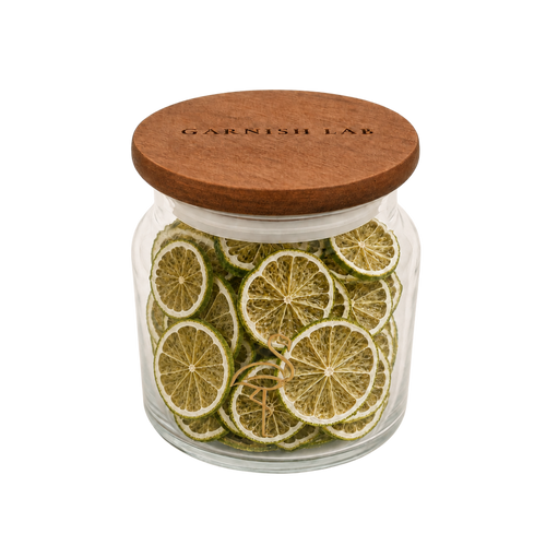 Dried lime wheels for cocktails, sliced thin and dried slow in West Palm Beach by Garnish Lab